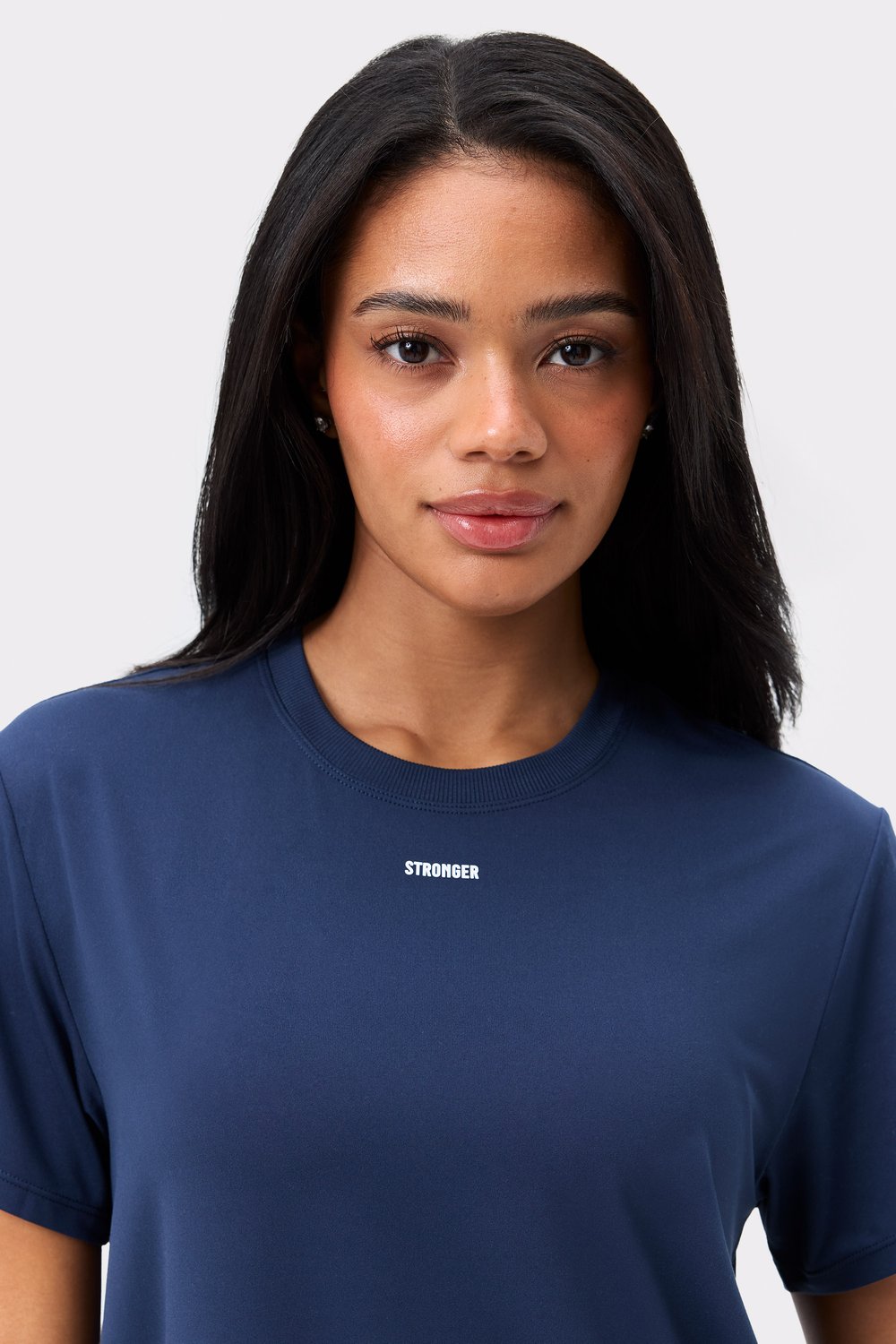 Dark blue Relaxed Tee by Stronger, featuring a centered white logo on the chest and a classic crew neck.