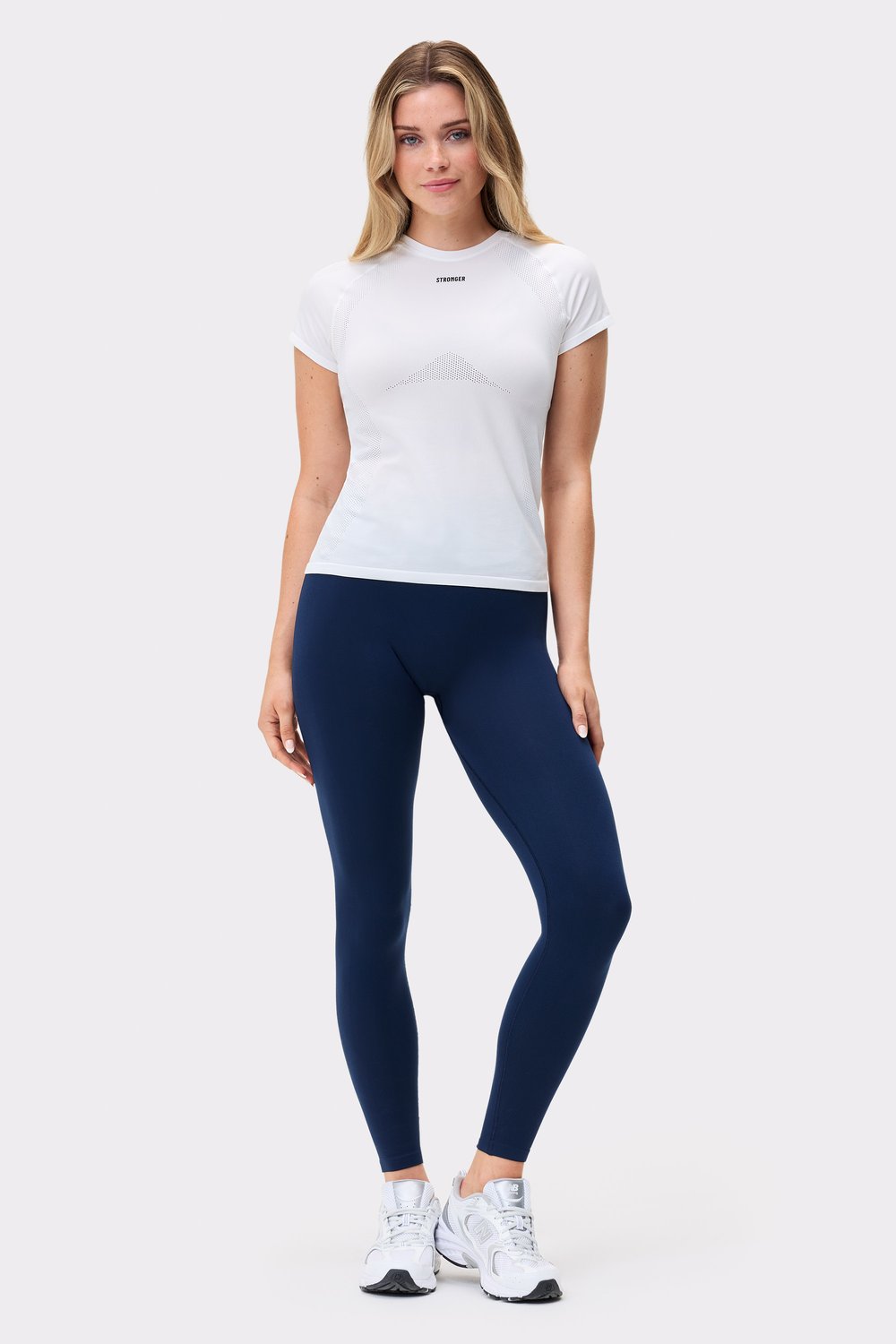 Bright White Stronger Seamless Performance T-shirt in a slim fit, featuring breathable perforated details on a model.
