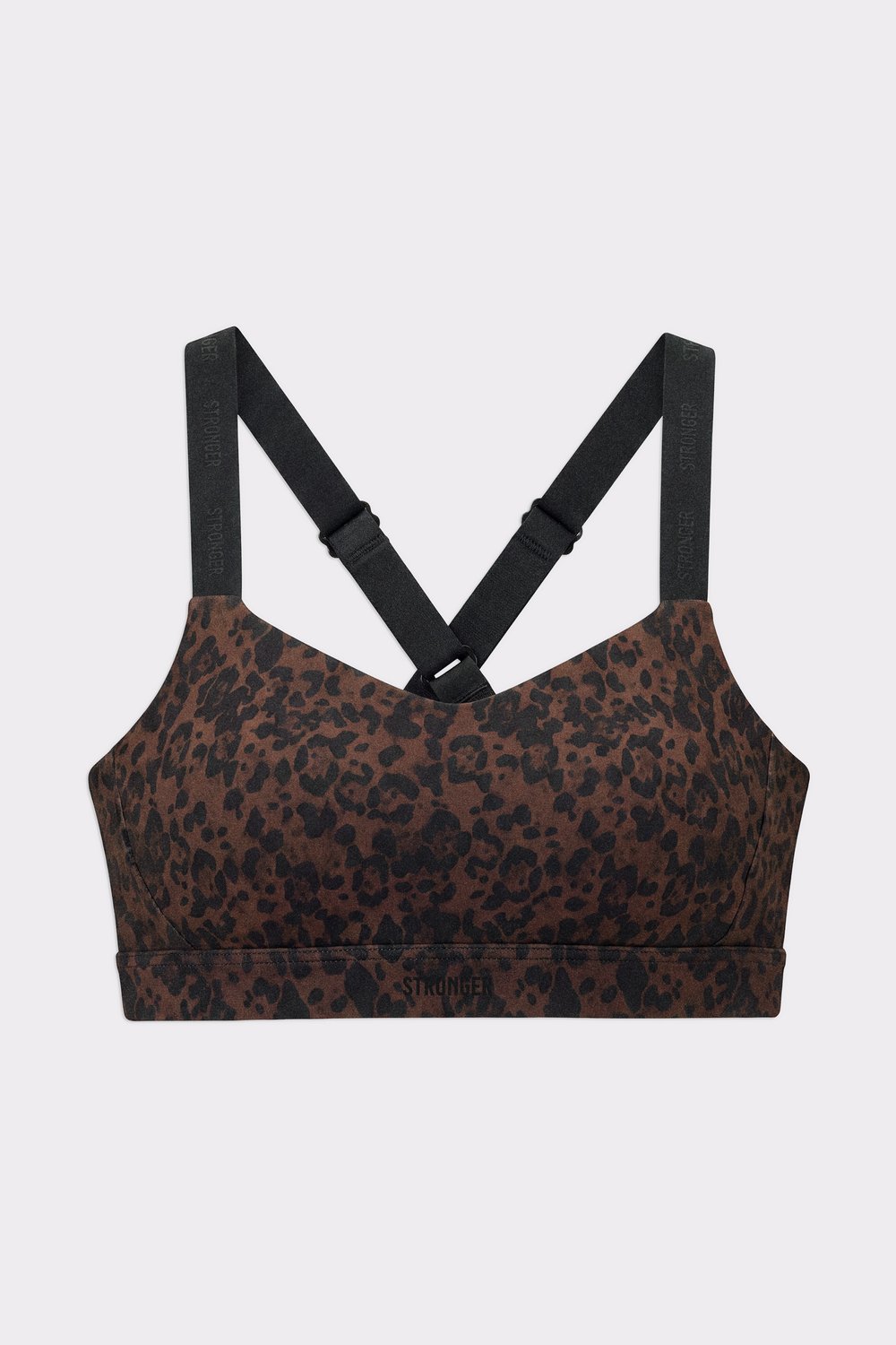 Front view of the Power Sports Bra in Dark Leo, showing the leopard print pattern and adjustable black shoulder straps.