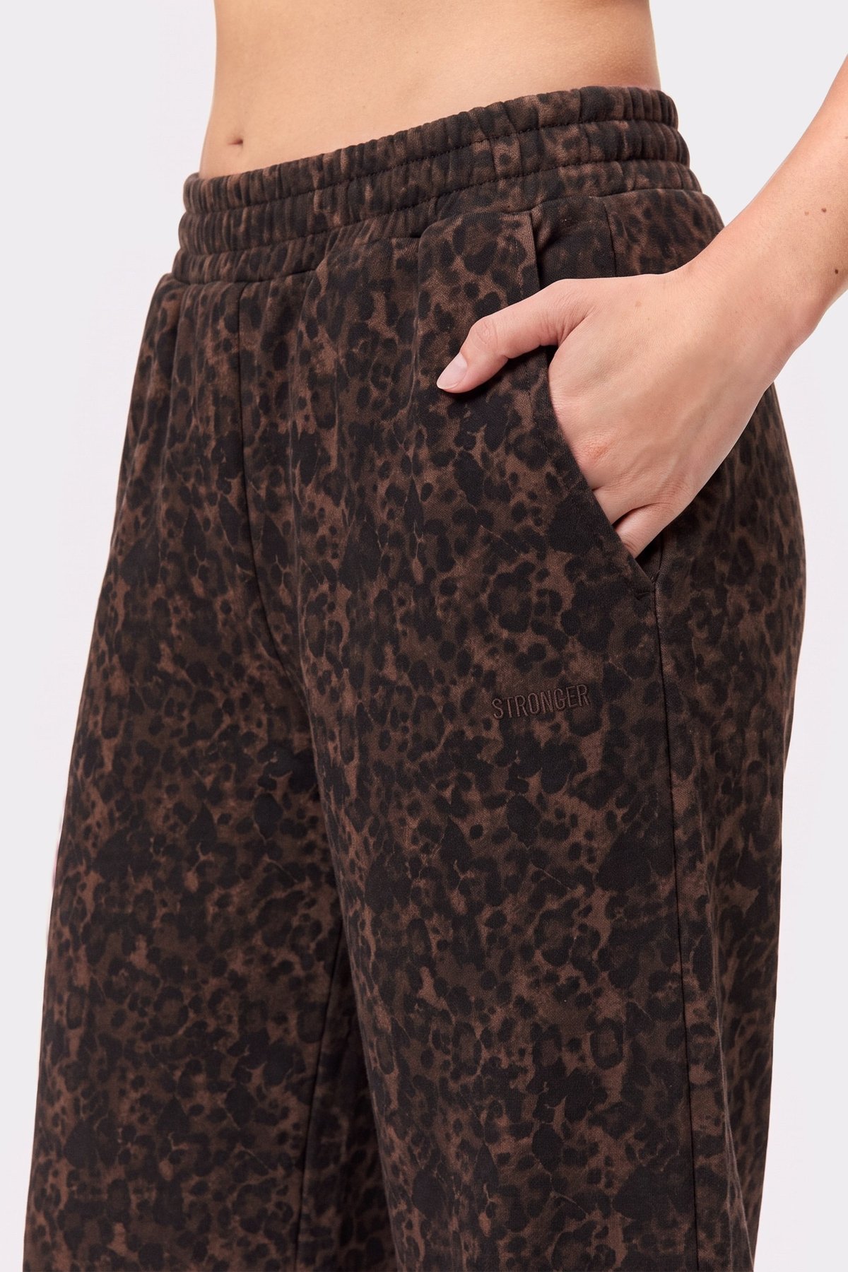 Close-up of the Relaxed Wide Sweatpants in Dark Leo from stronger, showing side pockets and waistband.