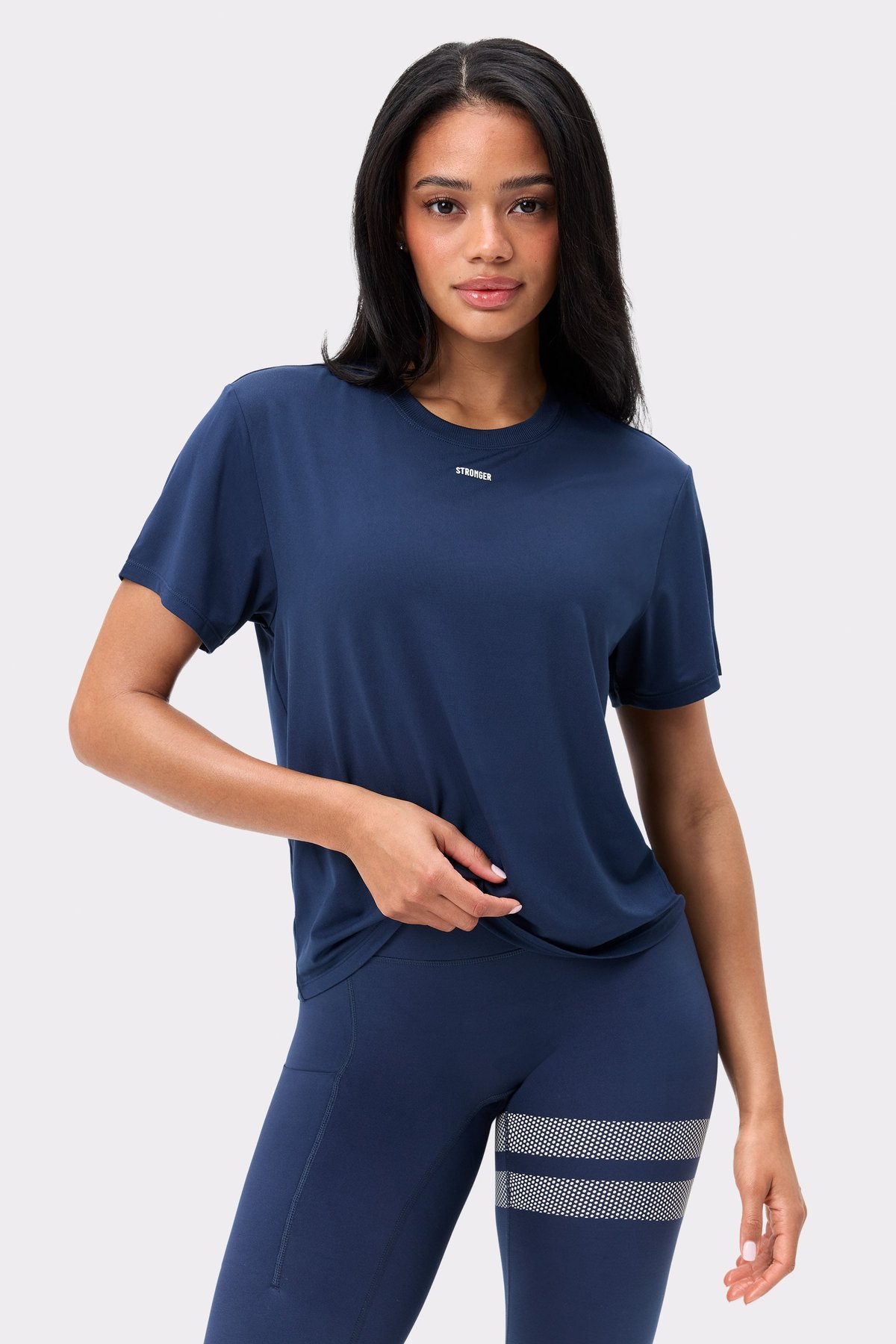 Front view of Stronger's Relaxed Tee in dark blue, a breathable short-sleeved workout top with a comfortable fit.