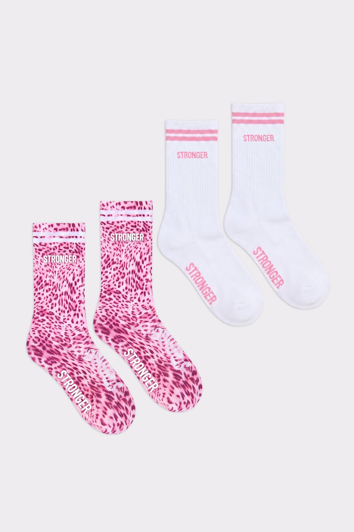 Essential Socks 2-pack from stronger in Pink Leo and Bright White, featuring signature stripes and knitted logotype details.