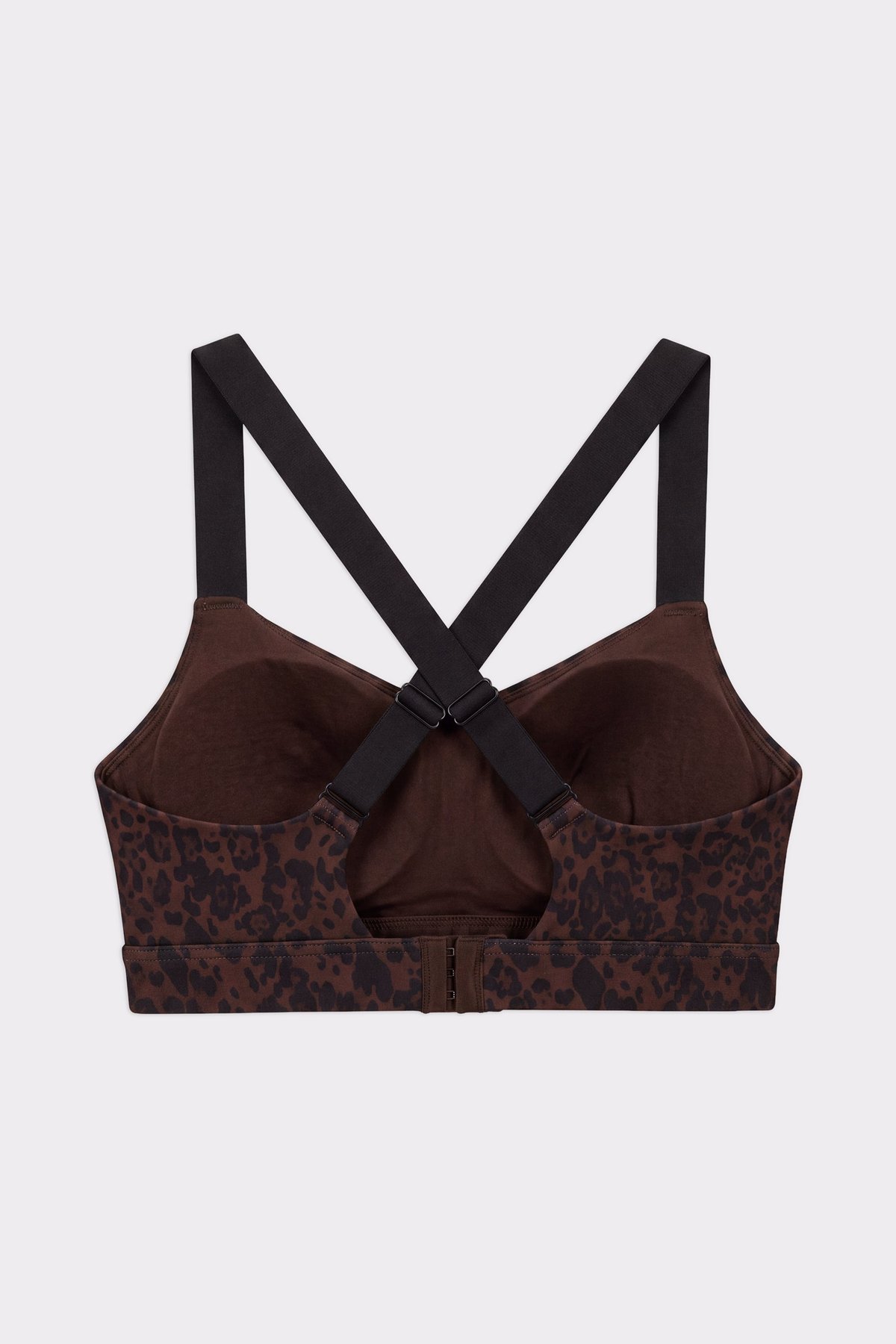 Back view of the Stronger Power Sports Bra in Dark Leo, showing the adjustable criss-cross straps and hook-and-eye closure.