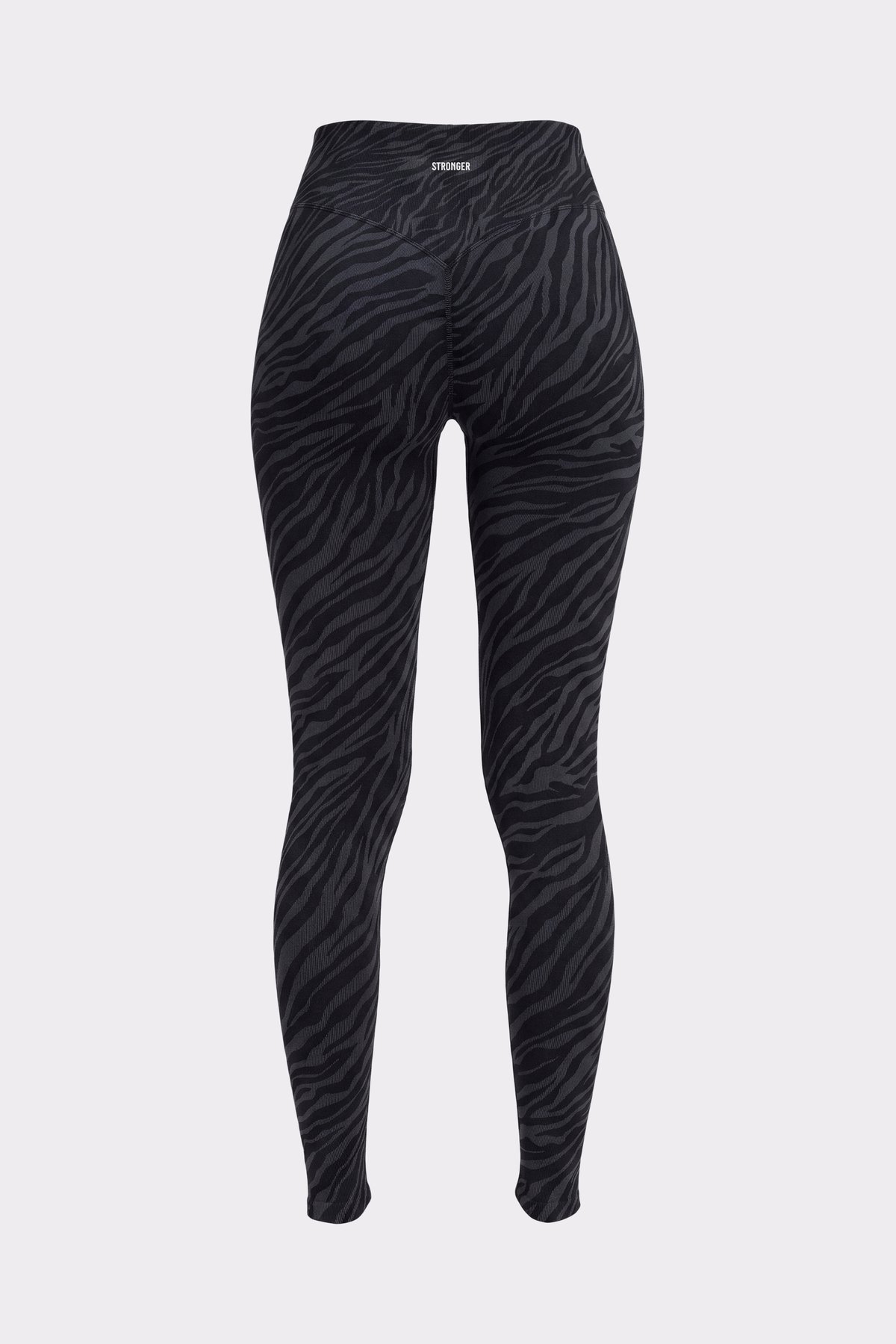 Rückansicht der Stronger Seamless Contour Jacquard Leggings mit schwarzem Zebraprint, die die hohe Taille zeigt.