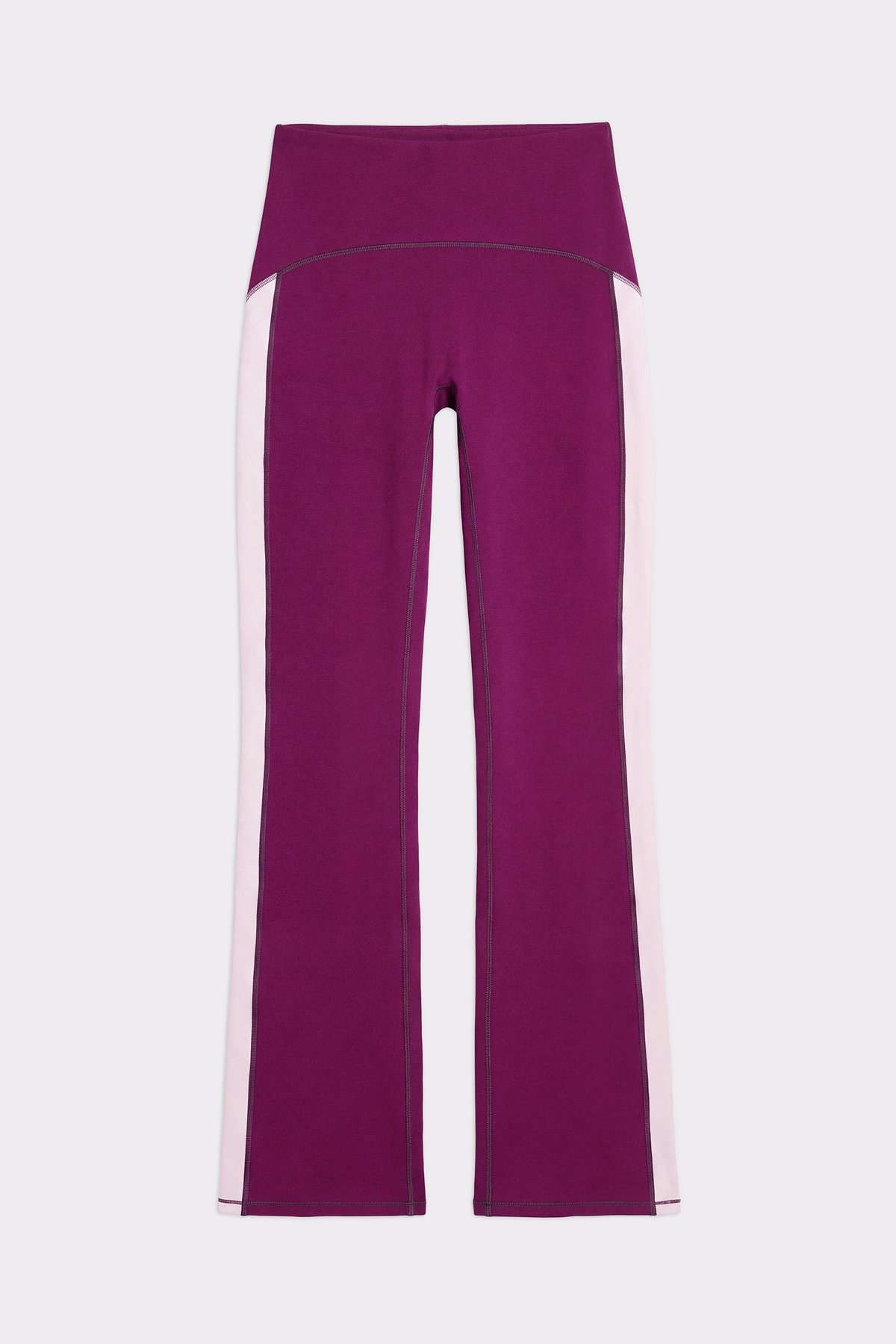 Close-up of the Stronger Thermal Bootcut Pants in aubergine purple showing the high waist and contrast side panels.