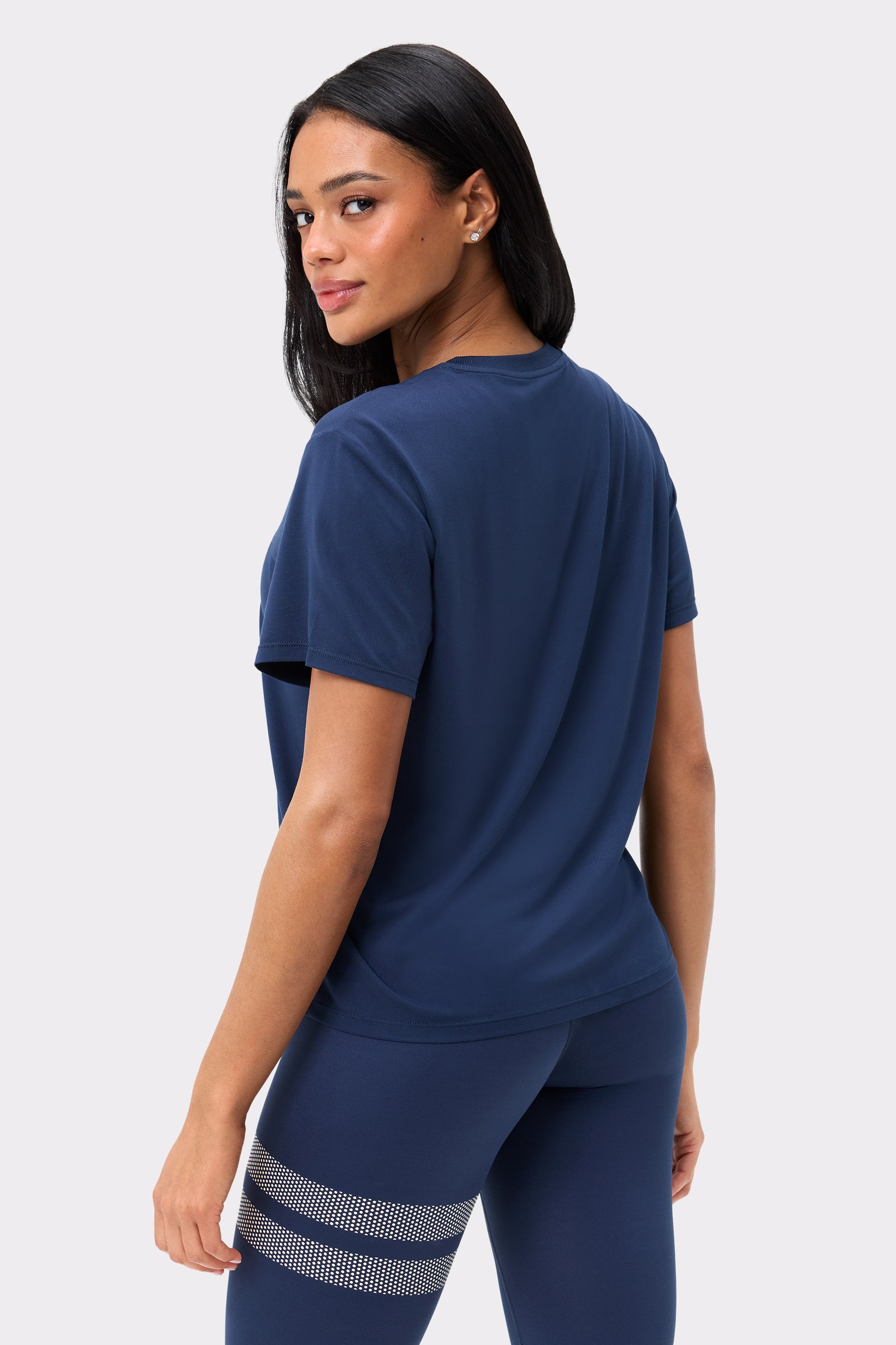 Back view of Stronger's Relaxed Tee in dark blue navy blazer, a quick-drying and breathable training t-shirt.