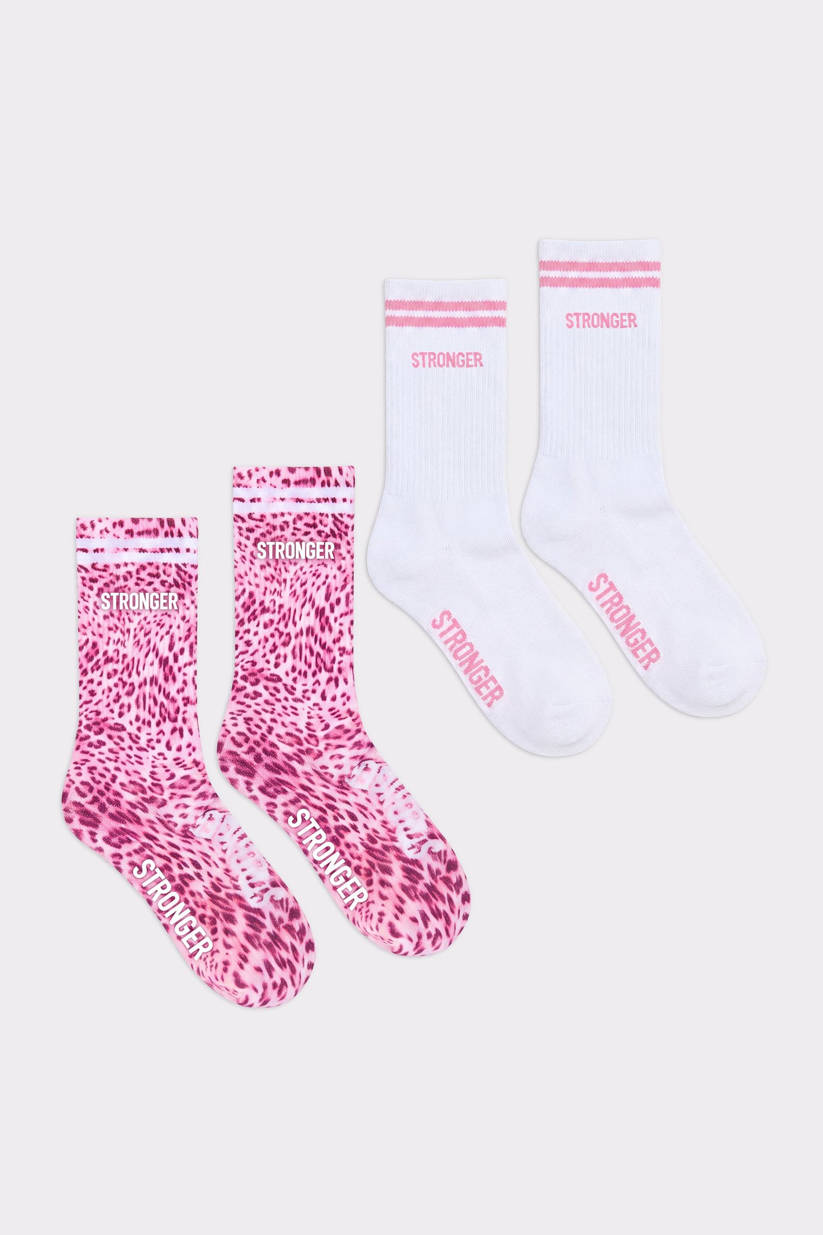 Essential Socks 2-pack from stronger in Pink Leo and Bright White, featuring signature stripes and knitted logotype details.