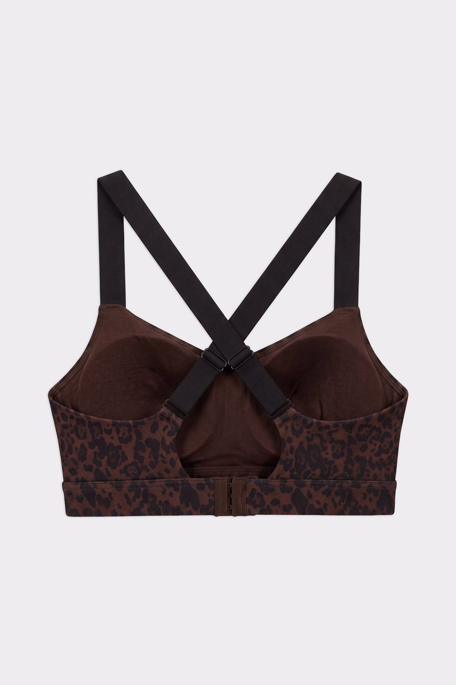 Back view of the Stronger Power Sports Bra in Dark Leo, showing the adjustable criss-cross straps and hook-and-eye closure.