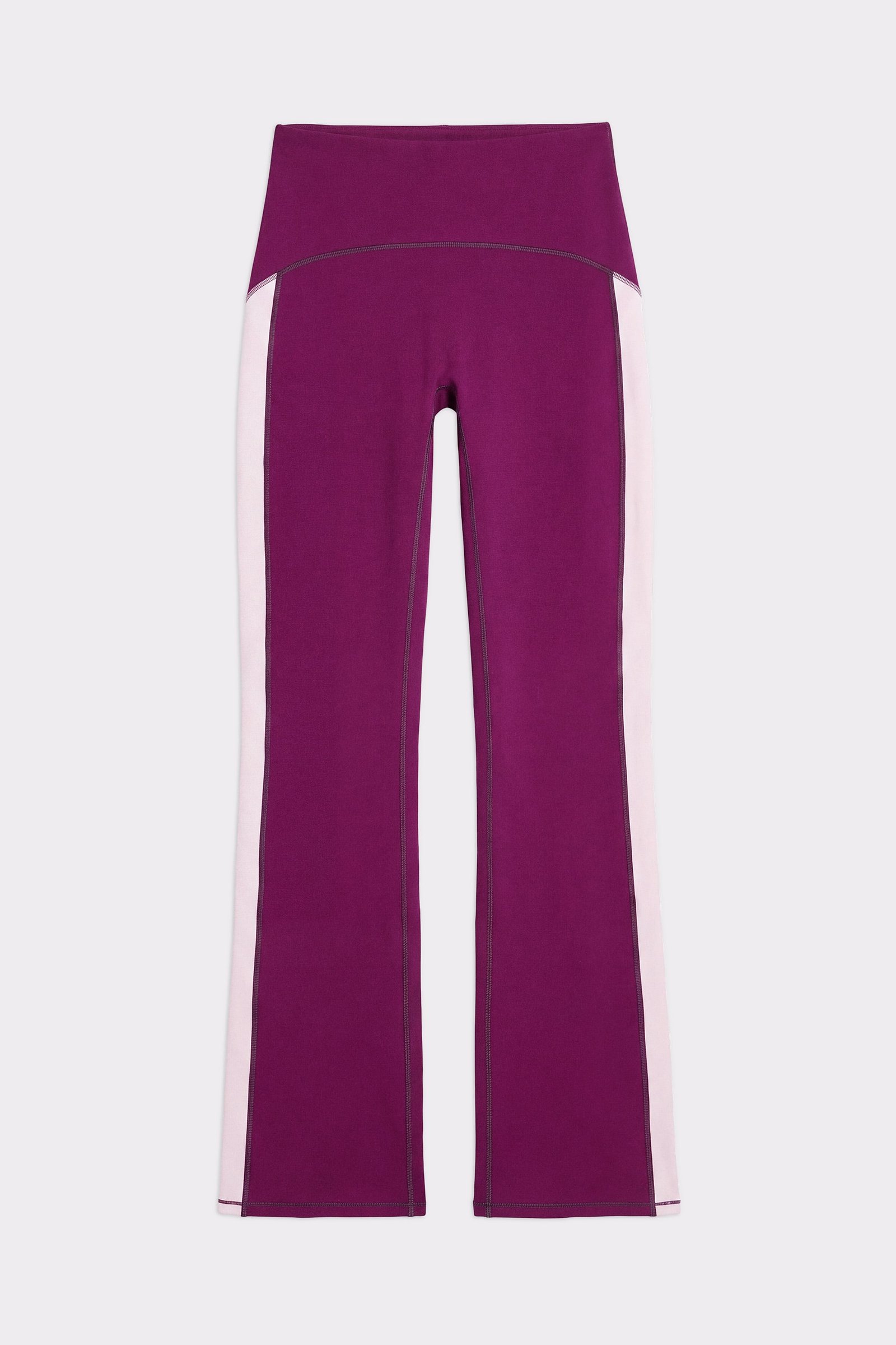 Close-up of the Stronger Thermal Bootcut Pants in aubergine purple showing the high waist and contrast side panels.